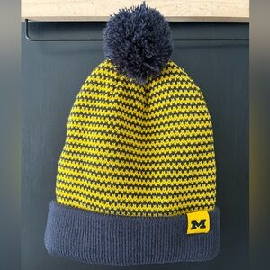 Nike Michigan Beanie Detachable Poof. Maize and Blue. 
Hail to the Victors.